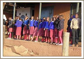 School children cheering Emily